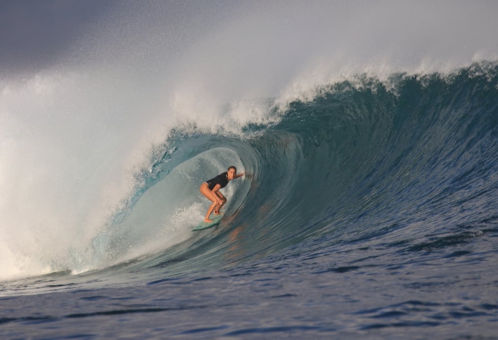 Brittany Penaroza Surfing on Barrel for Twin Fin Hotel